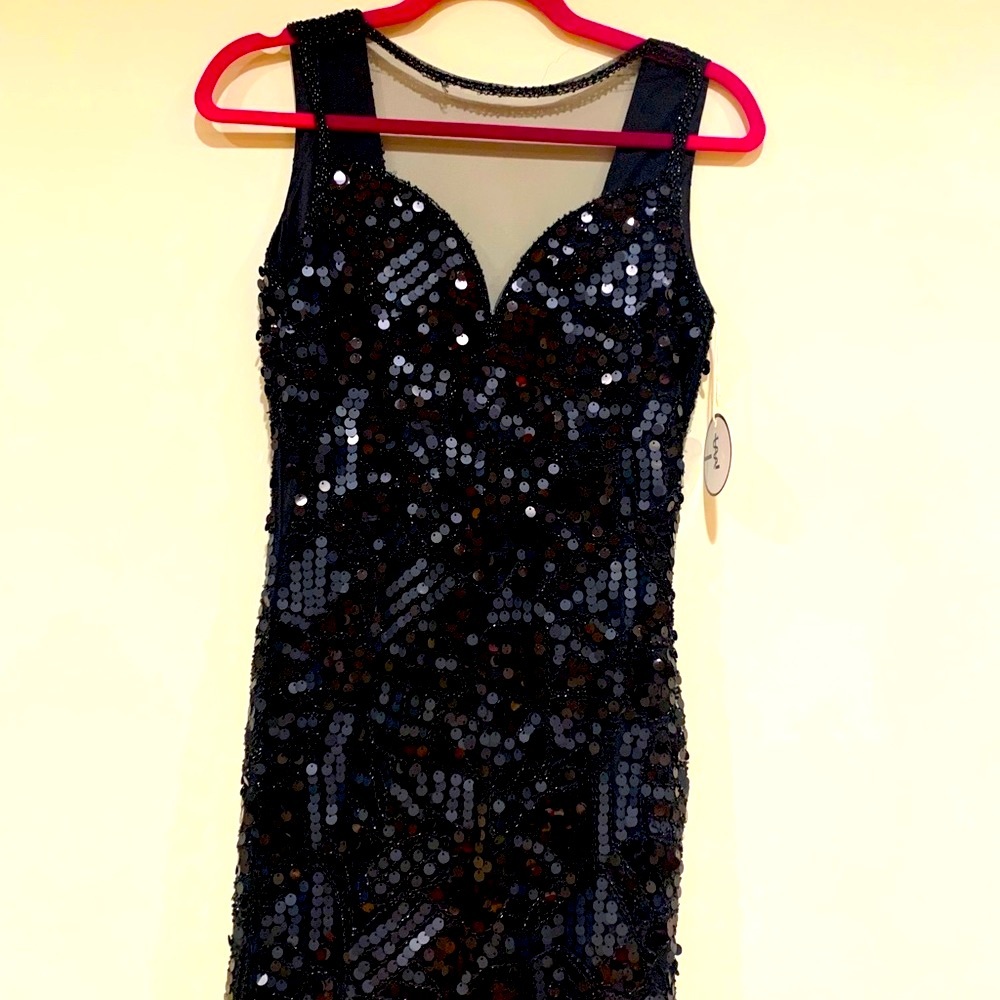 Glamorous brand new dress. Last few left!